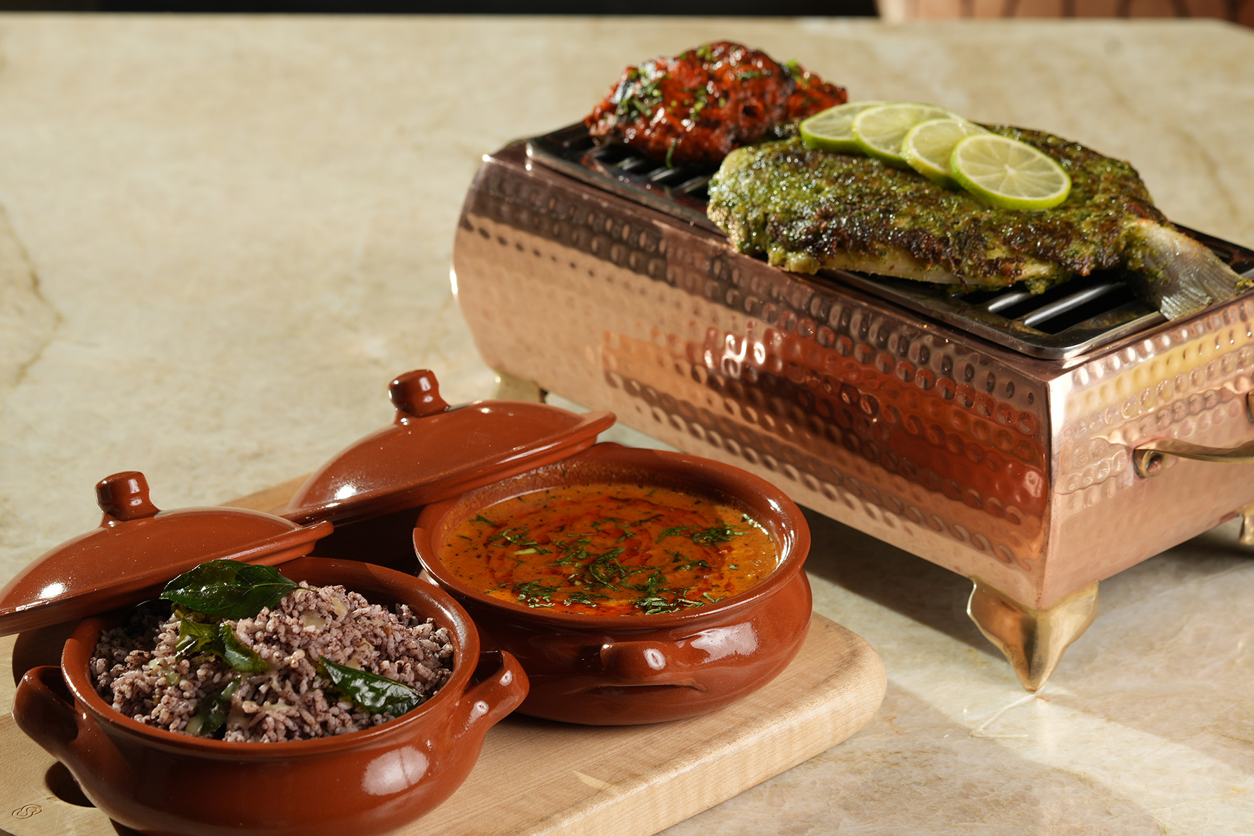 Roasted chilli marinated seabream
vadhyacha and kokum bhaat
tandoori portobello mushroom